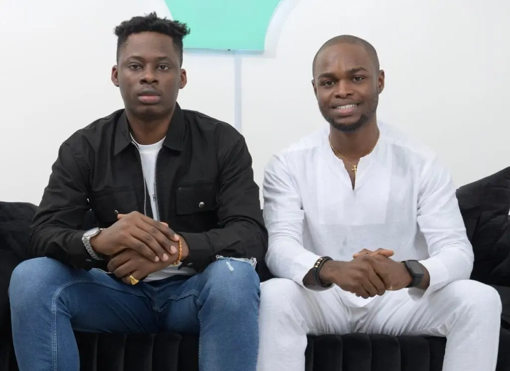 Allawee's two co-founders seated side by side