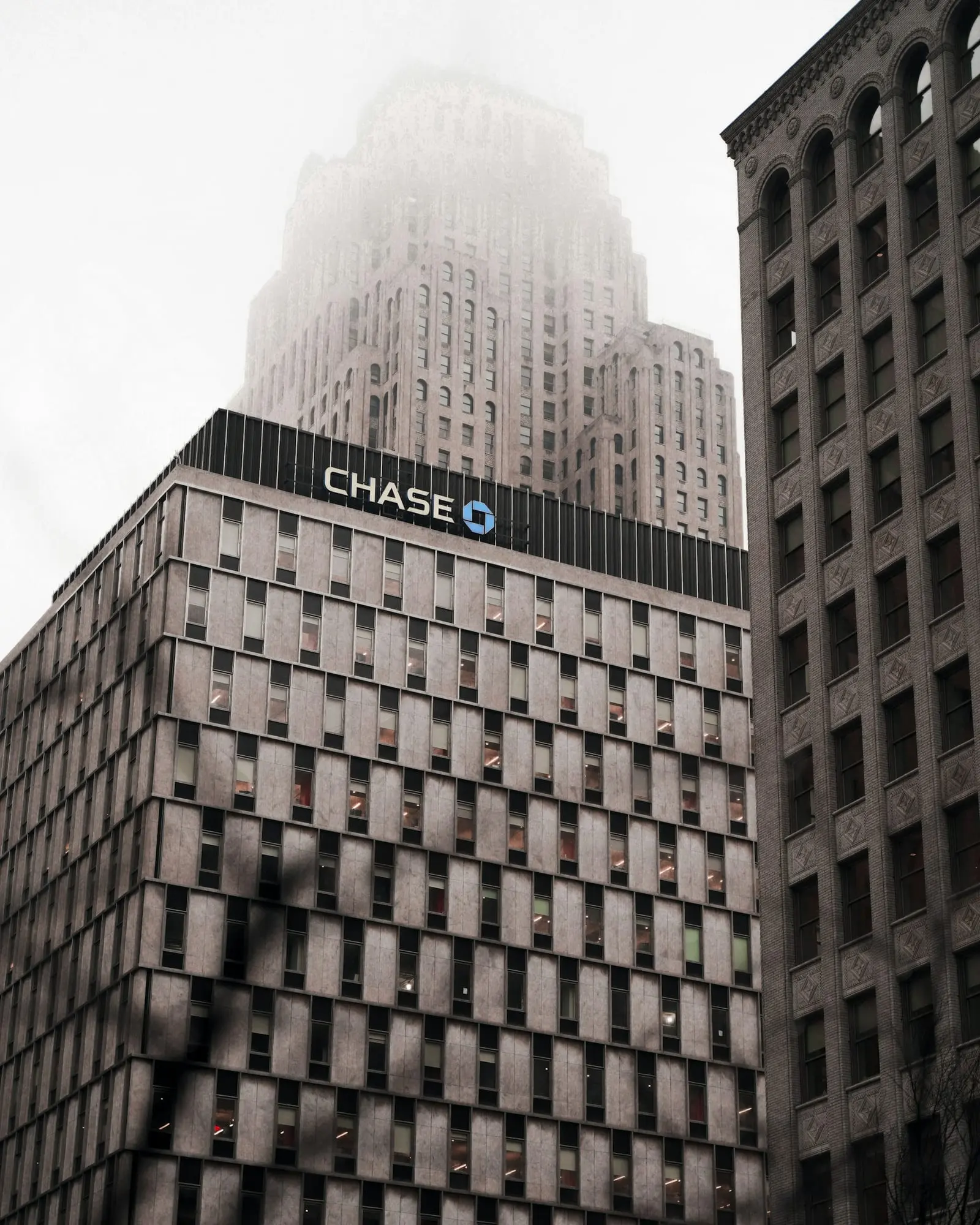 A tall Chase bank building with the Chase logo near the top