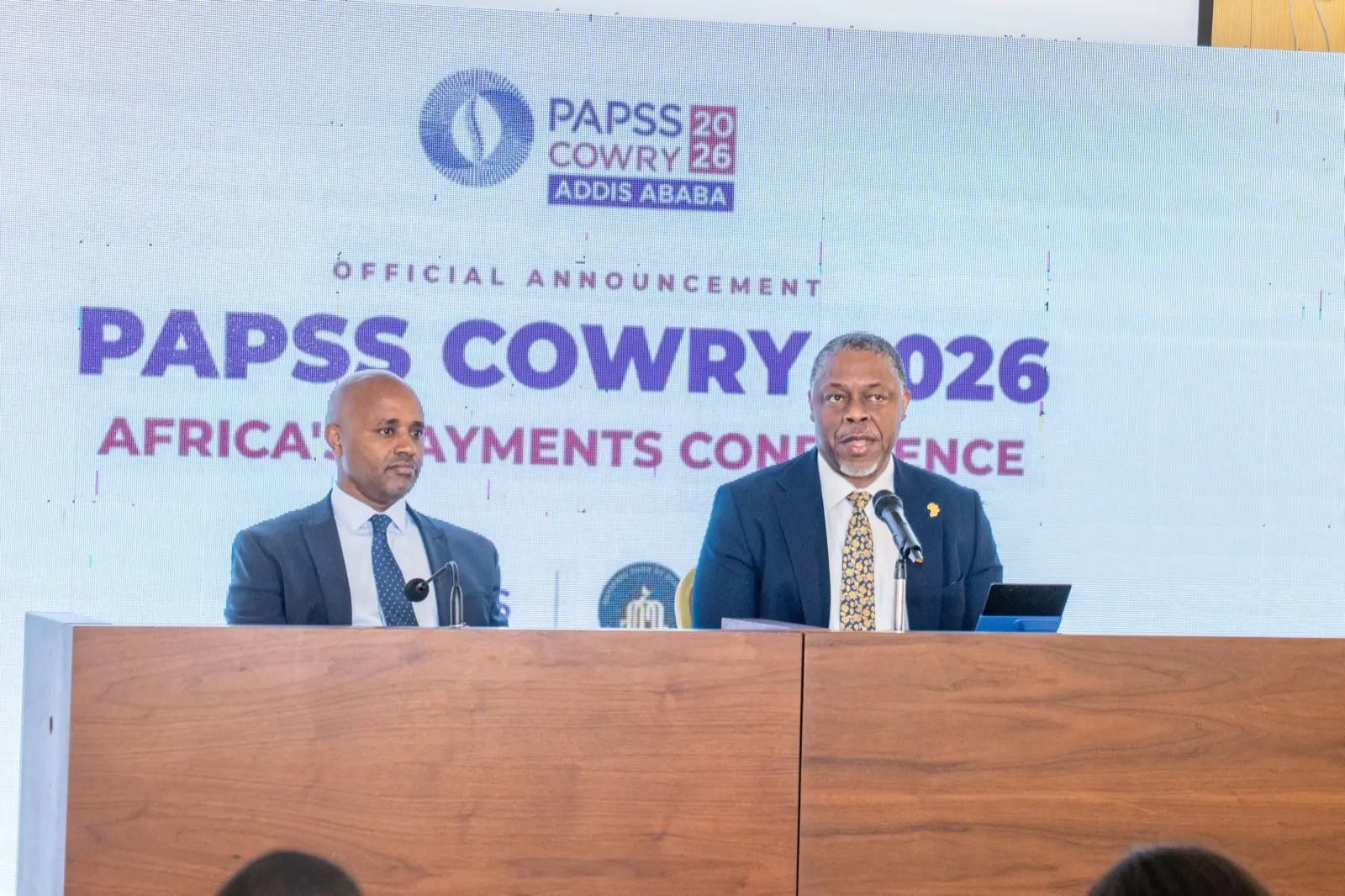 Eyob Tekalign, governor of the National Bank of Ethiopia, and PAPSS chief executive Mike Ogbalu III at a press conference in Addis Ababa announcing PAPSS COWRY 2026