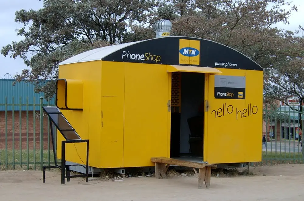 A small yellow MTN phone shop kiosk in South Africa