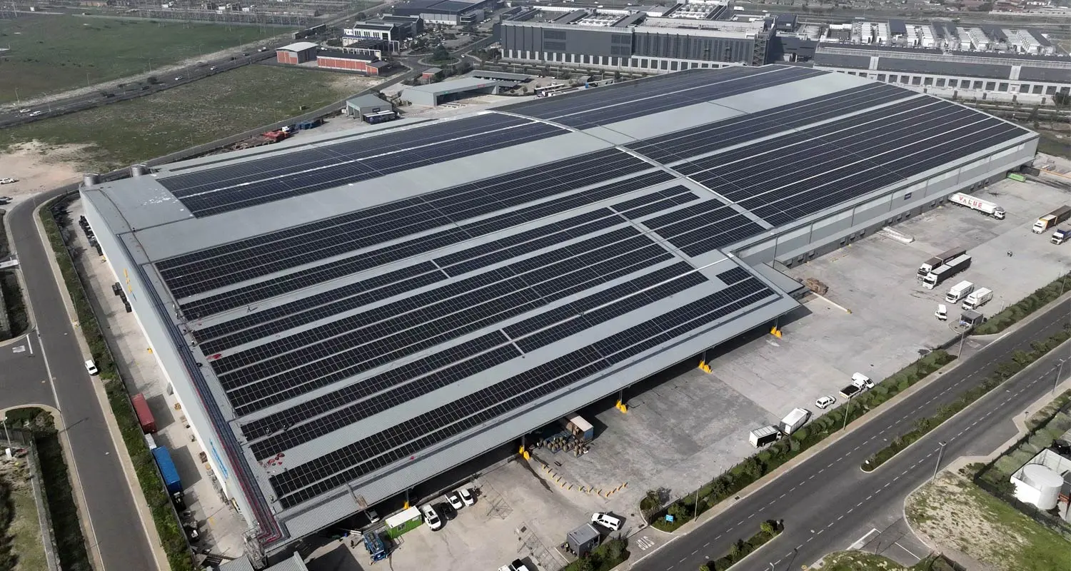Aerial view of the Massmart distribution centre in Brackengate, Cape Town, its roof covered in solar panels